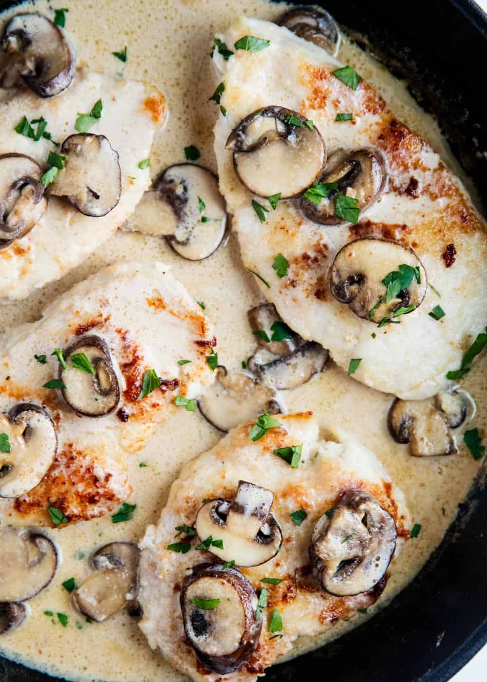 Chicken marsala in a skillet.