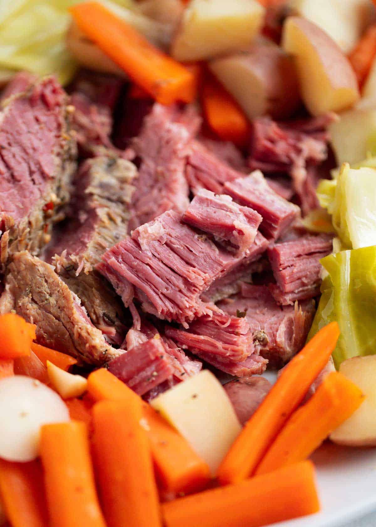 Corned beef and cabbage on a plate.