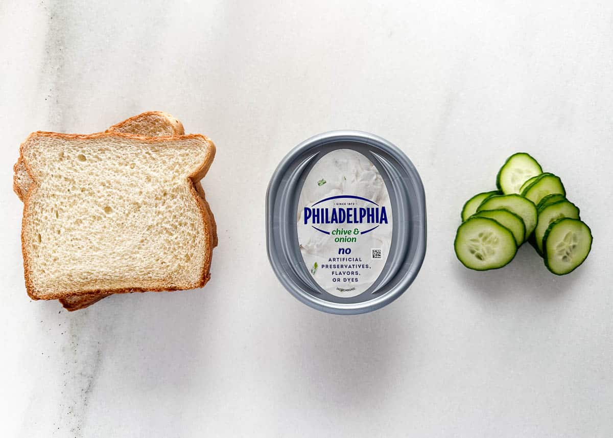 Cucumber sandwich ingredients on the counter.