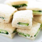 Stacked cucumber sandwiches.