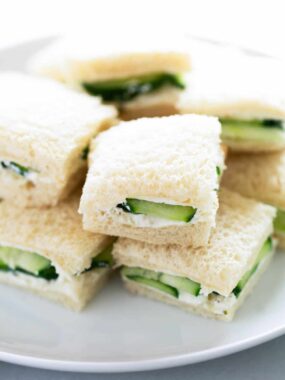 Stacked cucumber sandwiches.