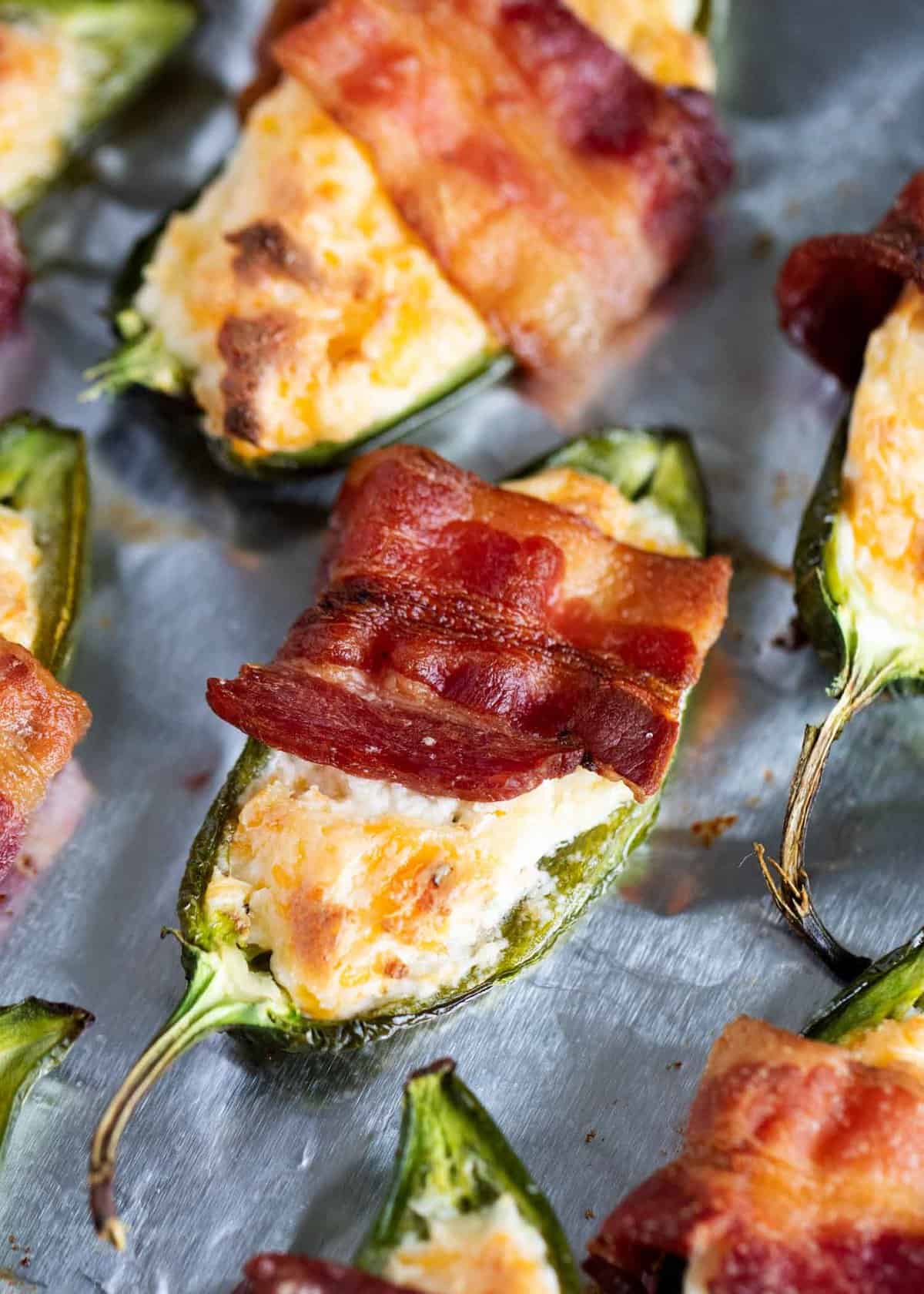 Jalepeno poppers on a pan.