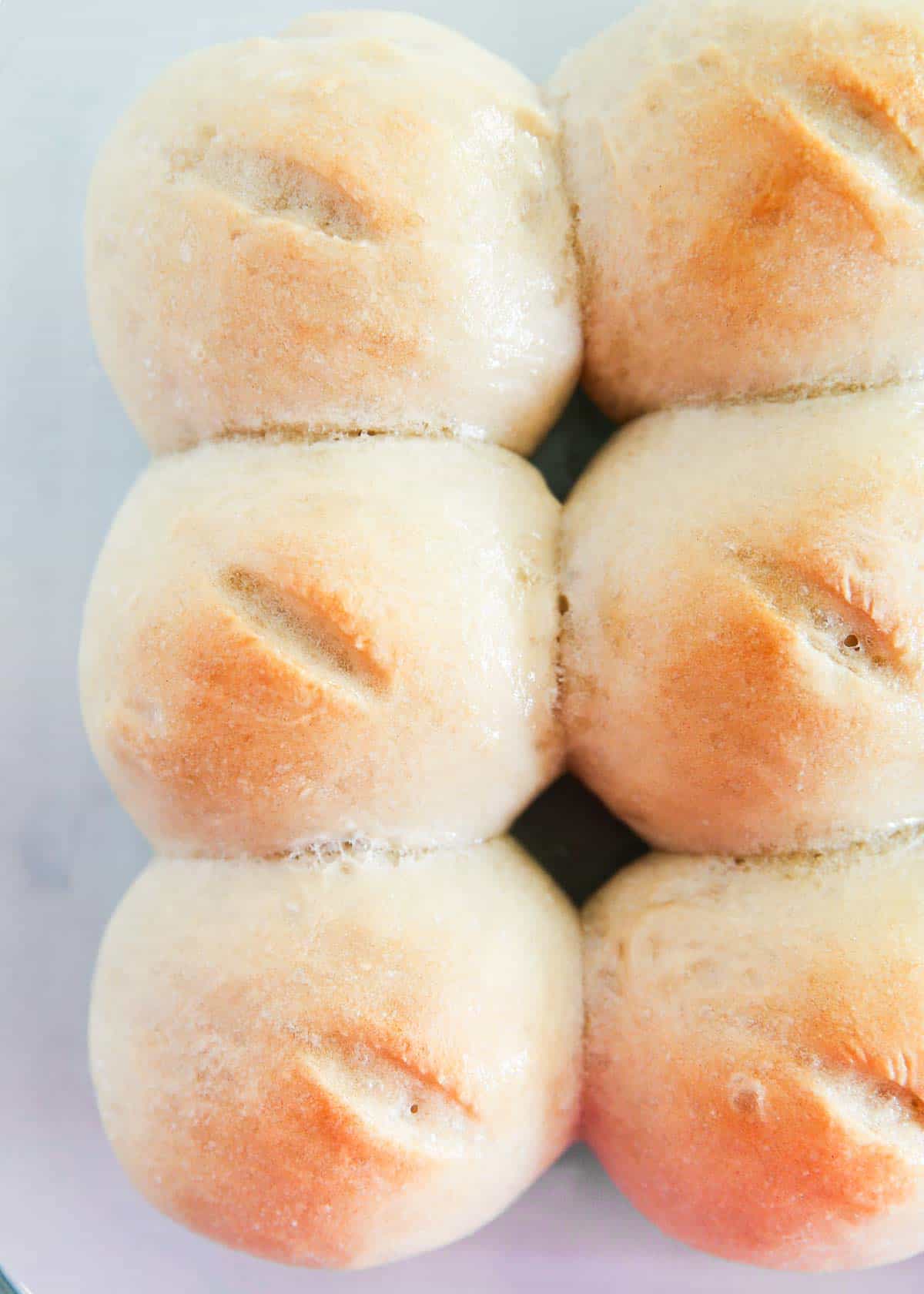 French bread rolls in baking dish.