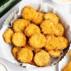 Fried zucchini recipe in a basket.