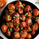 Honey garlic meatballs in a bowl.