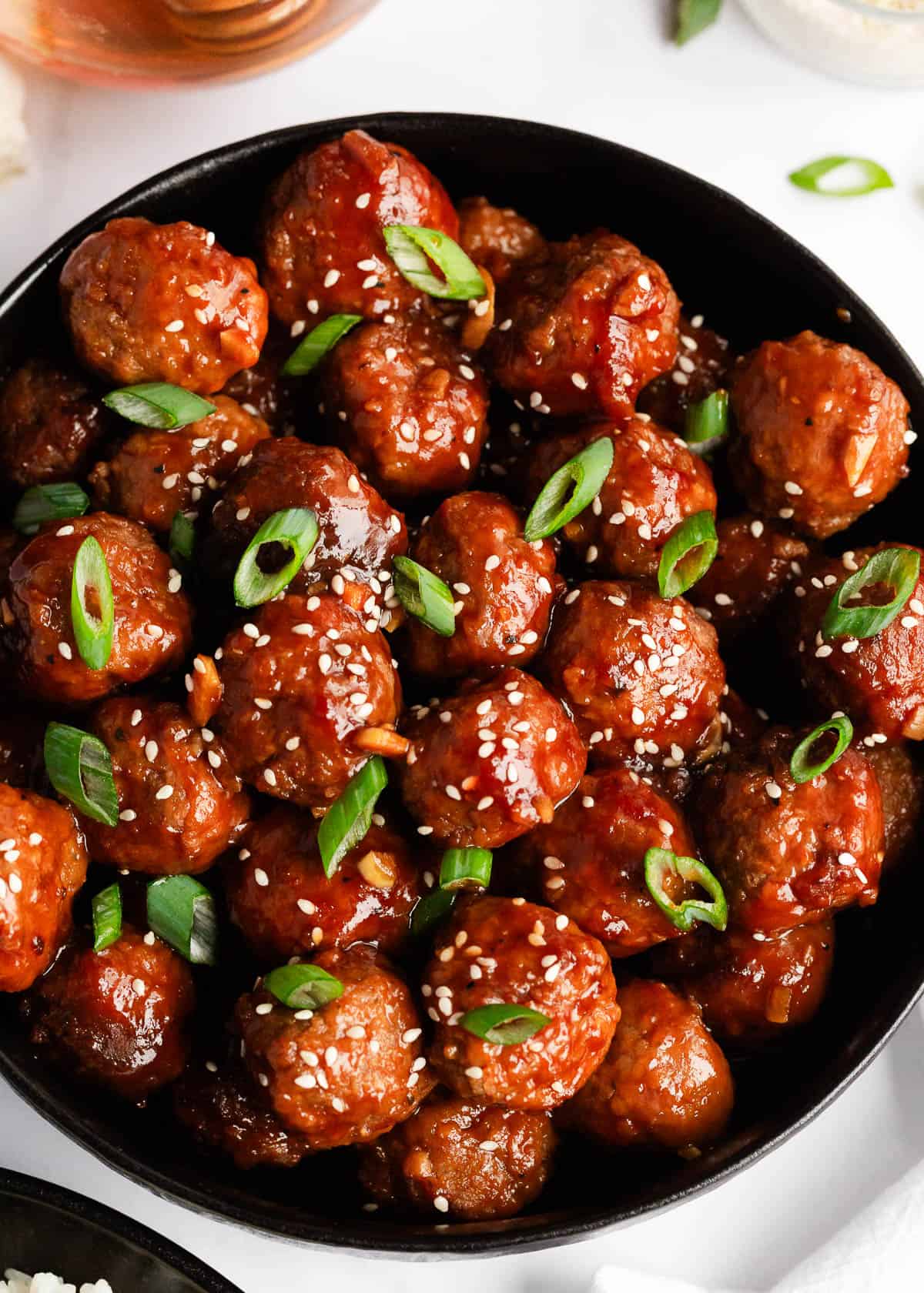 Honey garlic meatballs in a bowl.