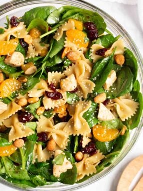 Spinach pasta salad in a bowl.
