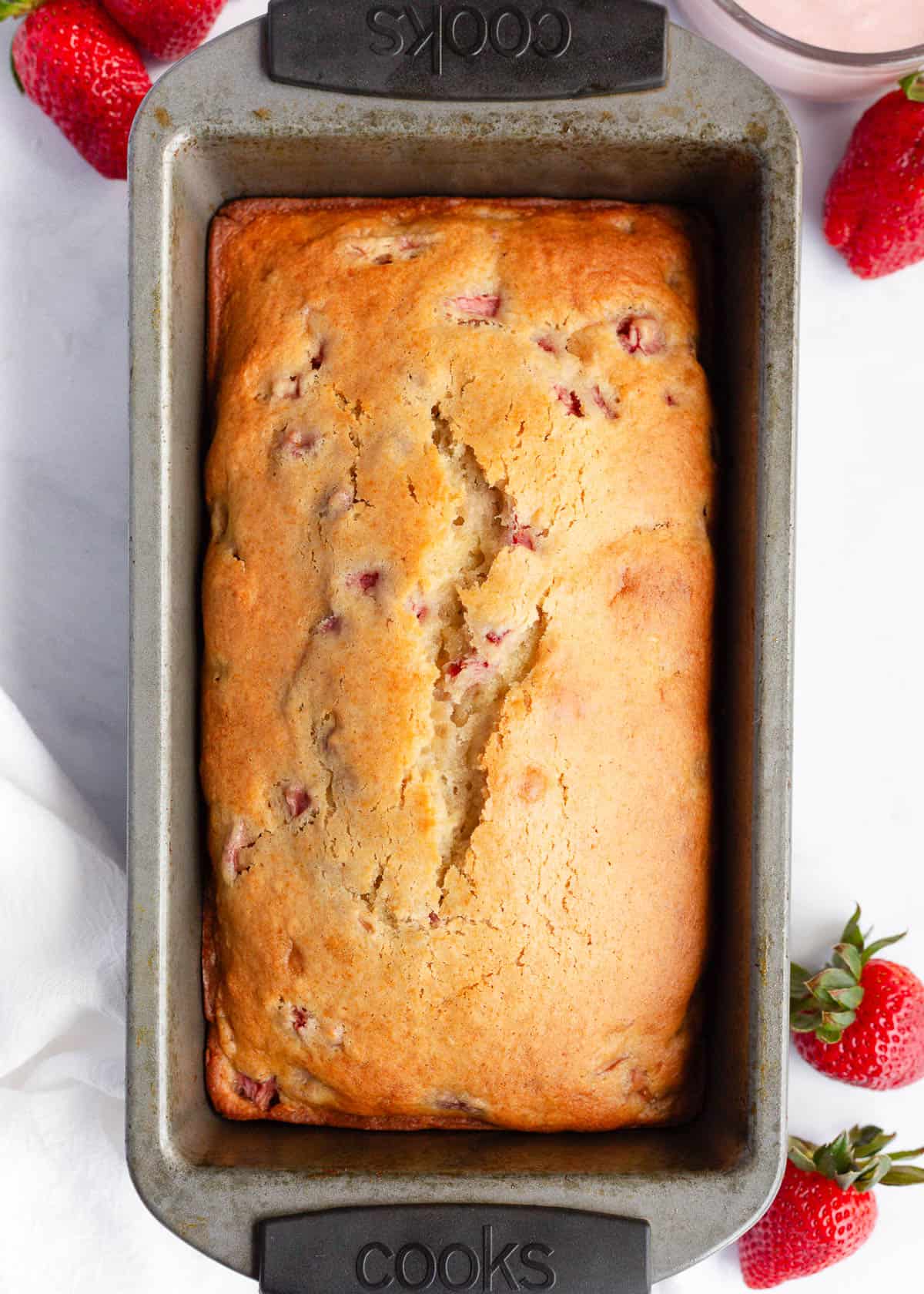 Strawberry bread in a loaf pan.