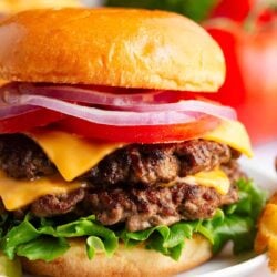 A smash burger on a plate.