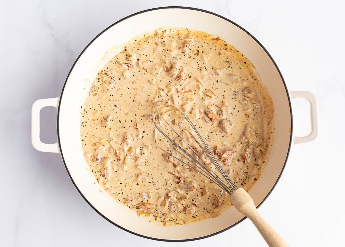 Making a creamy sauce for tuscan chicken.