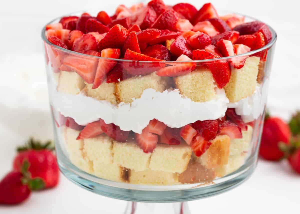 Second layer of pound cake, strawberries and whipped cream added to complete the strawberry shortcake trifle.