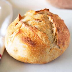 Sourdough bread loaf on counter.