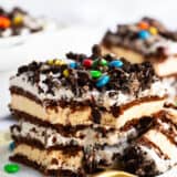 A slice of ice cream sandwich cake on a plate.