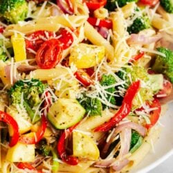 A close up photo of pasta primavera. .