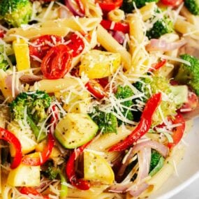 A close up photo of pasta primavera. .