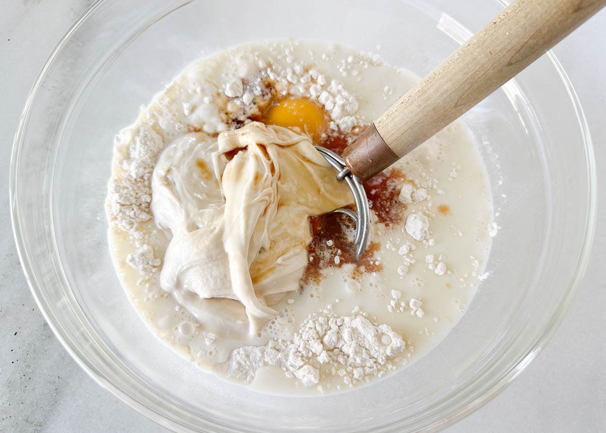 Showing how to make sourdough pancakes.