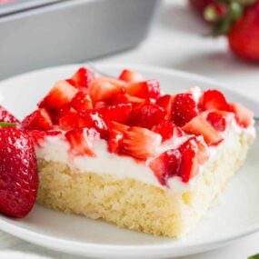 Strawberry shortcake bars on a plate.