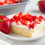 Strawberry shortcake bars on a white plate.