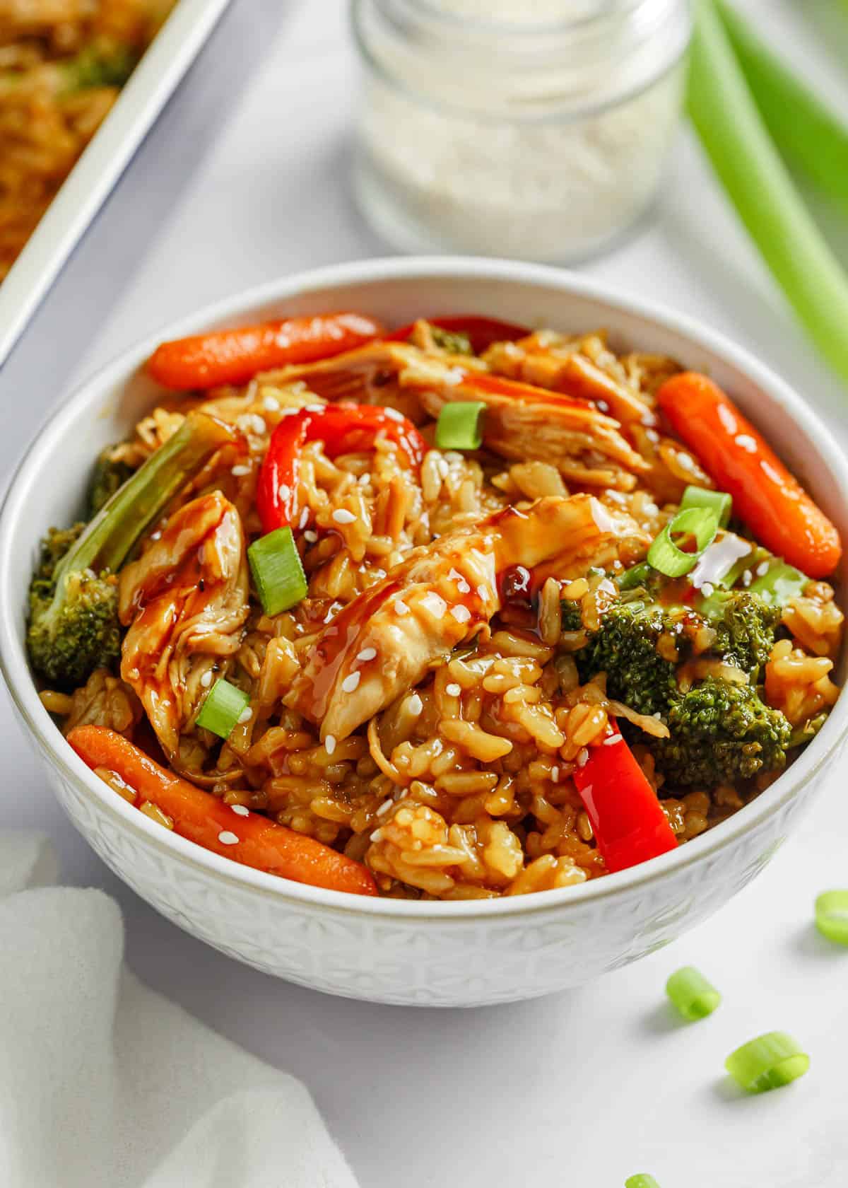 Teriyaki chicken casserole in a white bowl.