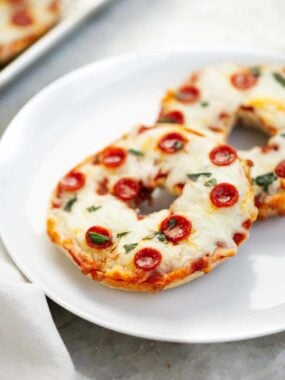 Pizza bagels on a plate.