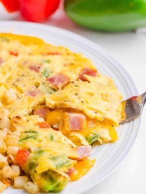 Western omelette on a plate.