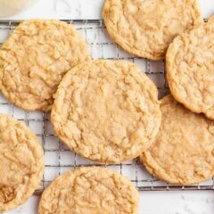Coconut cookies on a cooling rack.