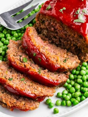 Sliced lipton onion soup meatloaf on a platter to serve for a family dinner.