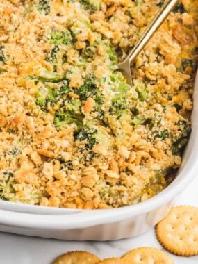 Broccoli cheese casserole in a baking dish.