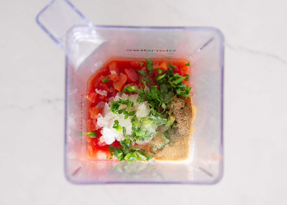 Showing how to make chilis salsa.