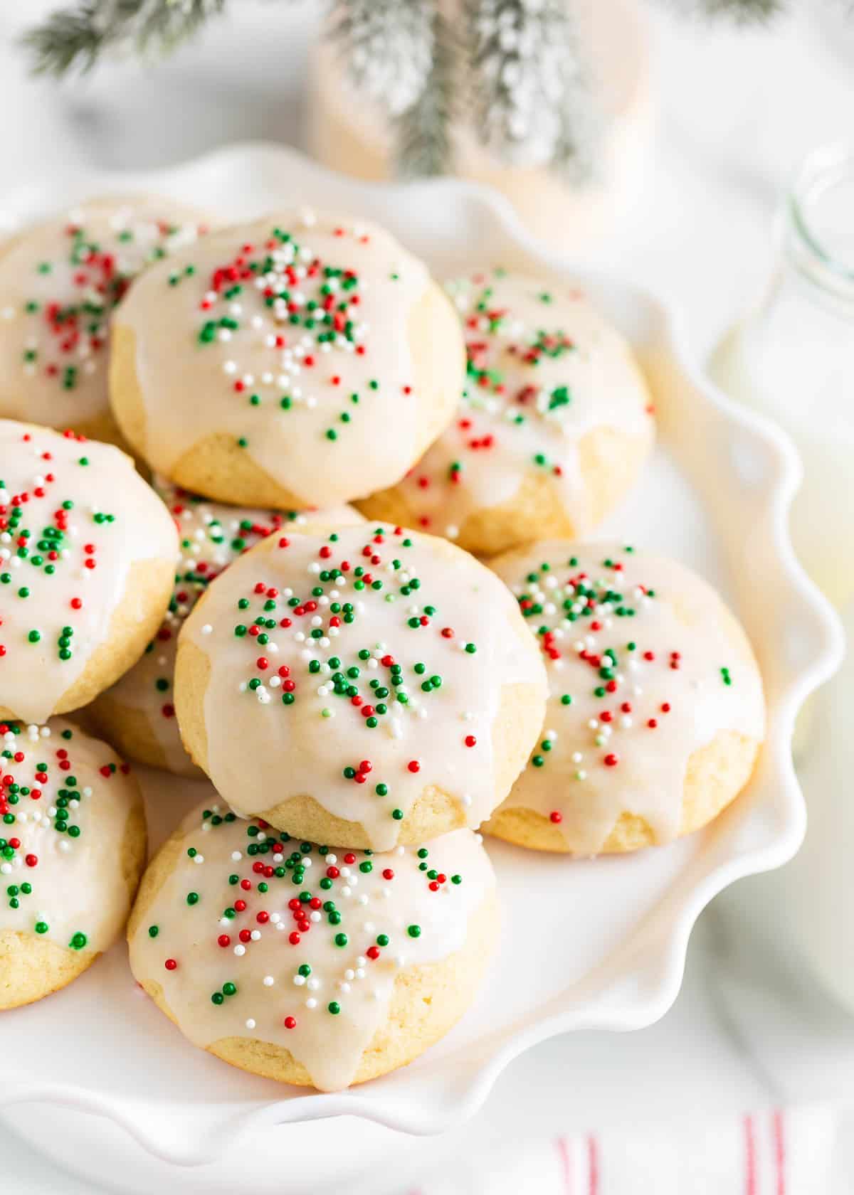 Italian Christmas cookies on a cake plate.