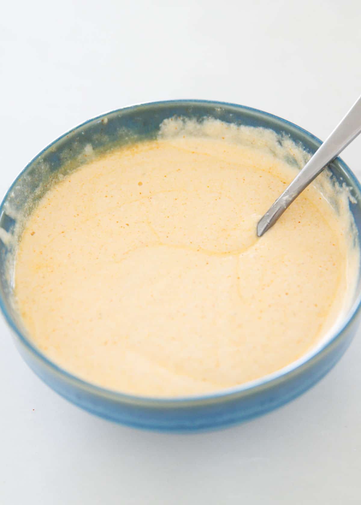 Showing how to make cottage cheese queso.