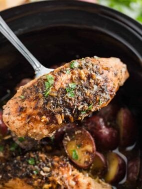 Crockpot chicken and potatoes in slow cooker.
