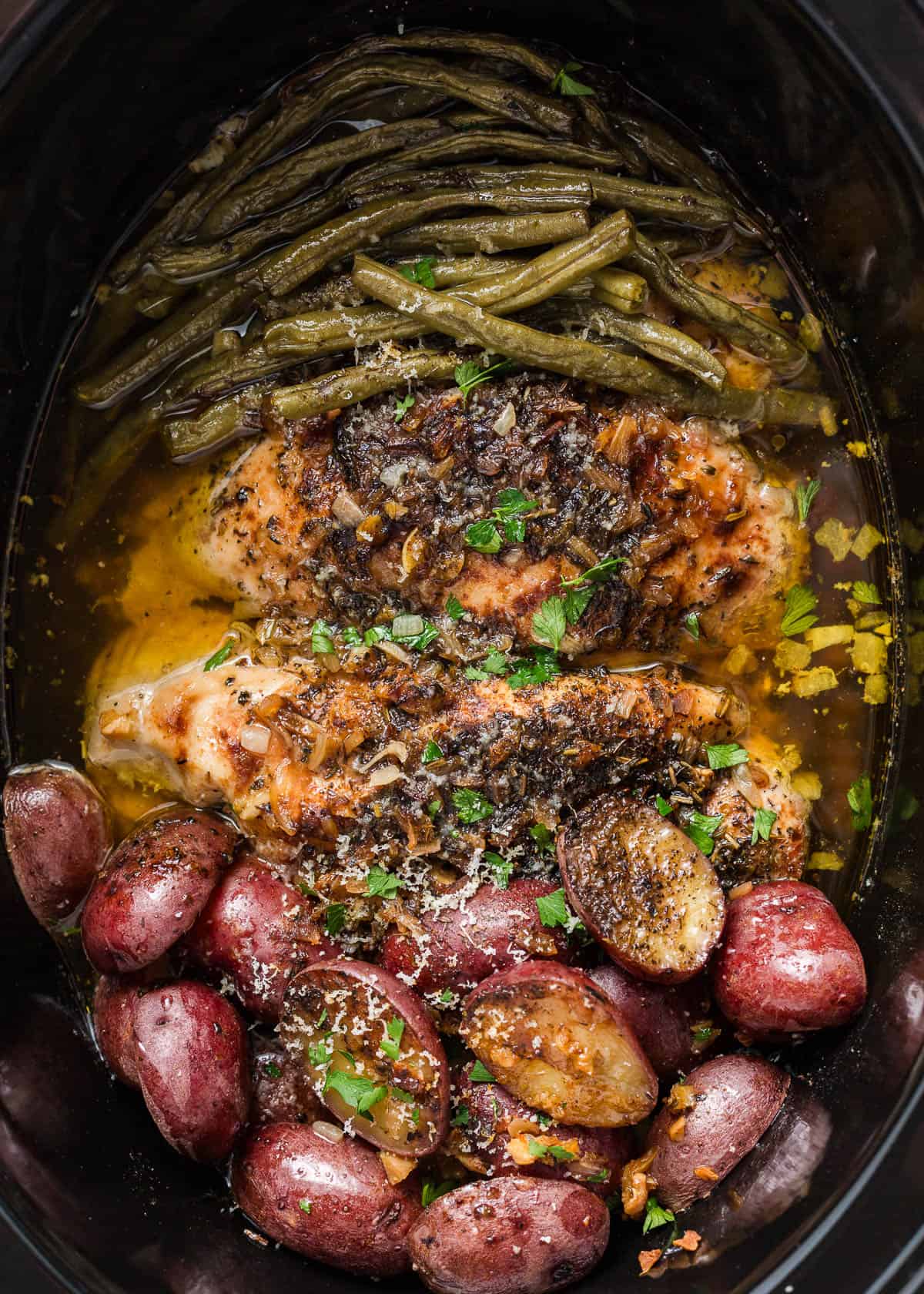 This crockpot chicken potatoes and green beans is a wholesome, home-cooked dinner that comes together in one pot with almost no effort! Crockpot chicken and potatoes.