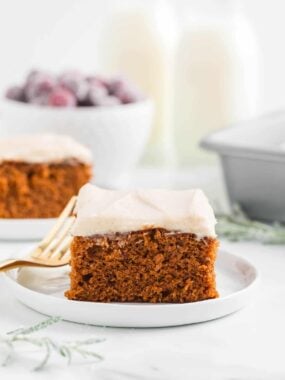 Slice of gingerbread cake on a plate.