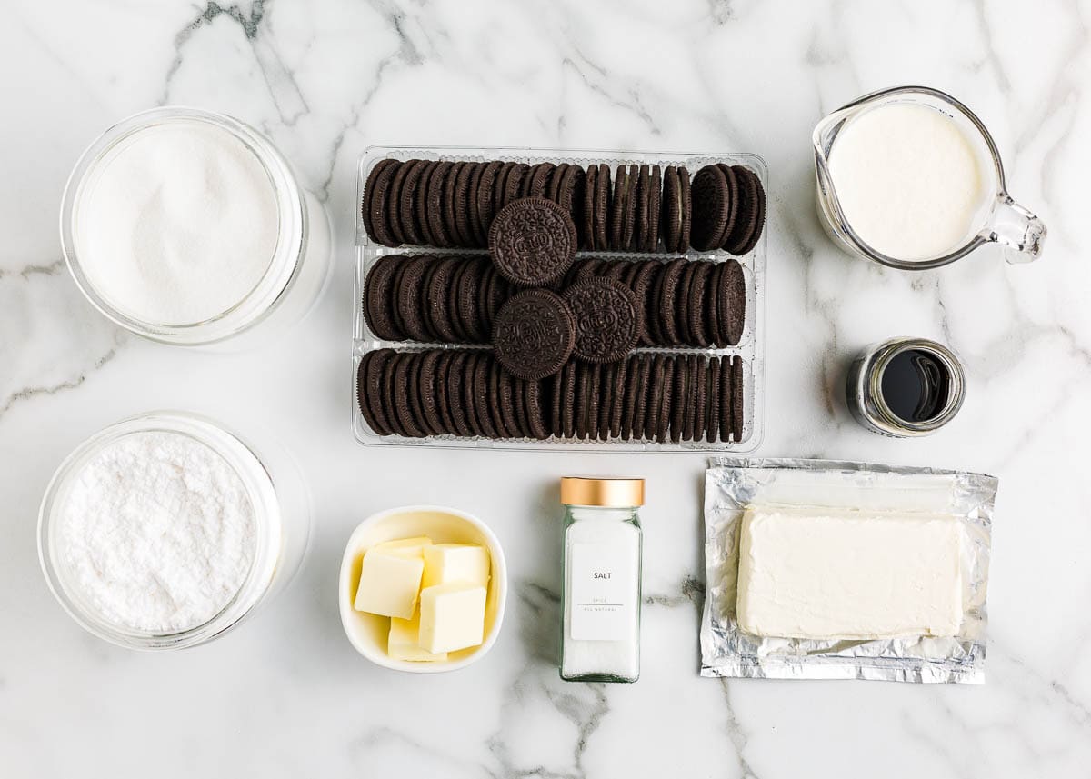 Made with a chocolaty Oreo cookie crust and a creamy Oreo cheesecake filling using simple ingredients, this easy no-bake Oreo pie sets up in the fridge in just a few hours! Oreo pie ingredients on the counter.