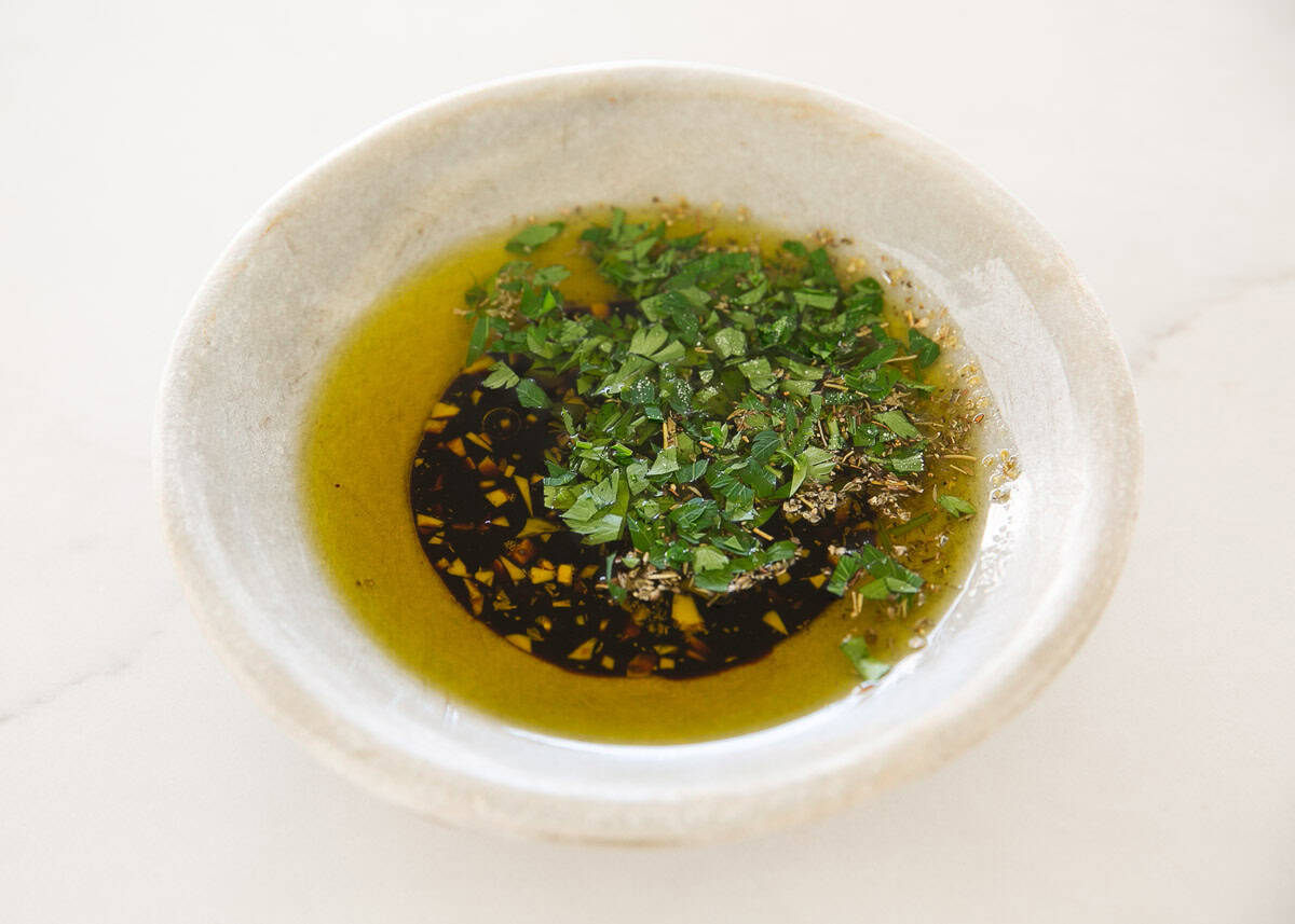 Showing how to make bread dipping oil.