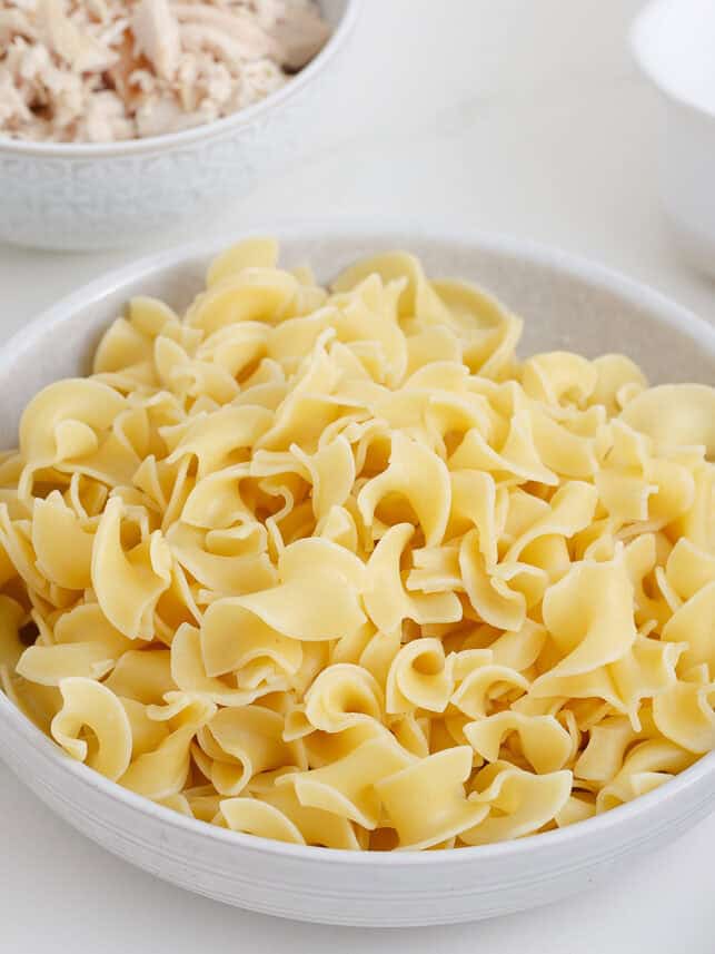 Egg noodles in a bowl.