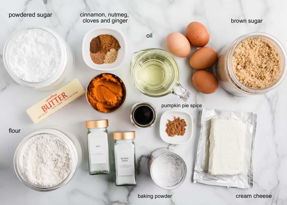 Pumpkin cake ingredients on counter.