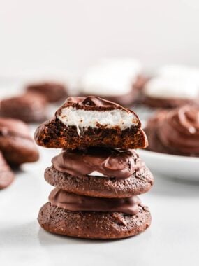 Chocolate marshmallow cookies with chocolate on top.