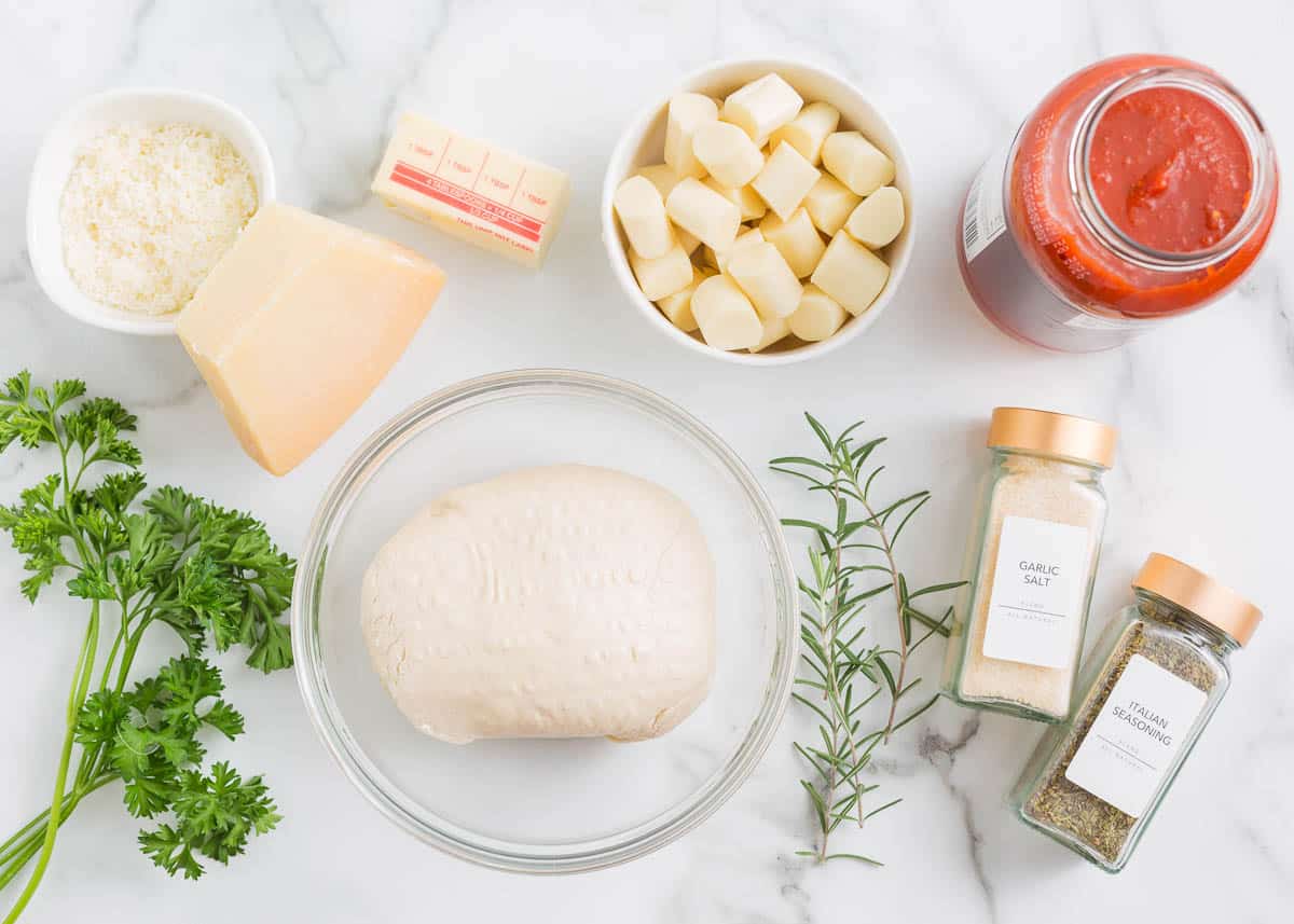 Christmas tree pull apart bread ingredients on counter.
