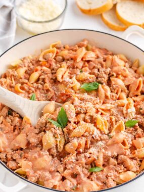 Creamy pink pasta sauce with ground turkey and shell pasta served straight from the skillet.