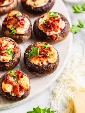 Stuffed mushrooms appetizer on a plate for serving.