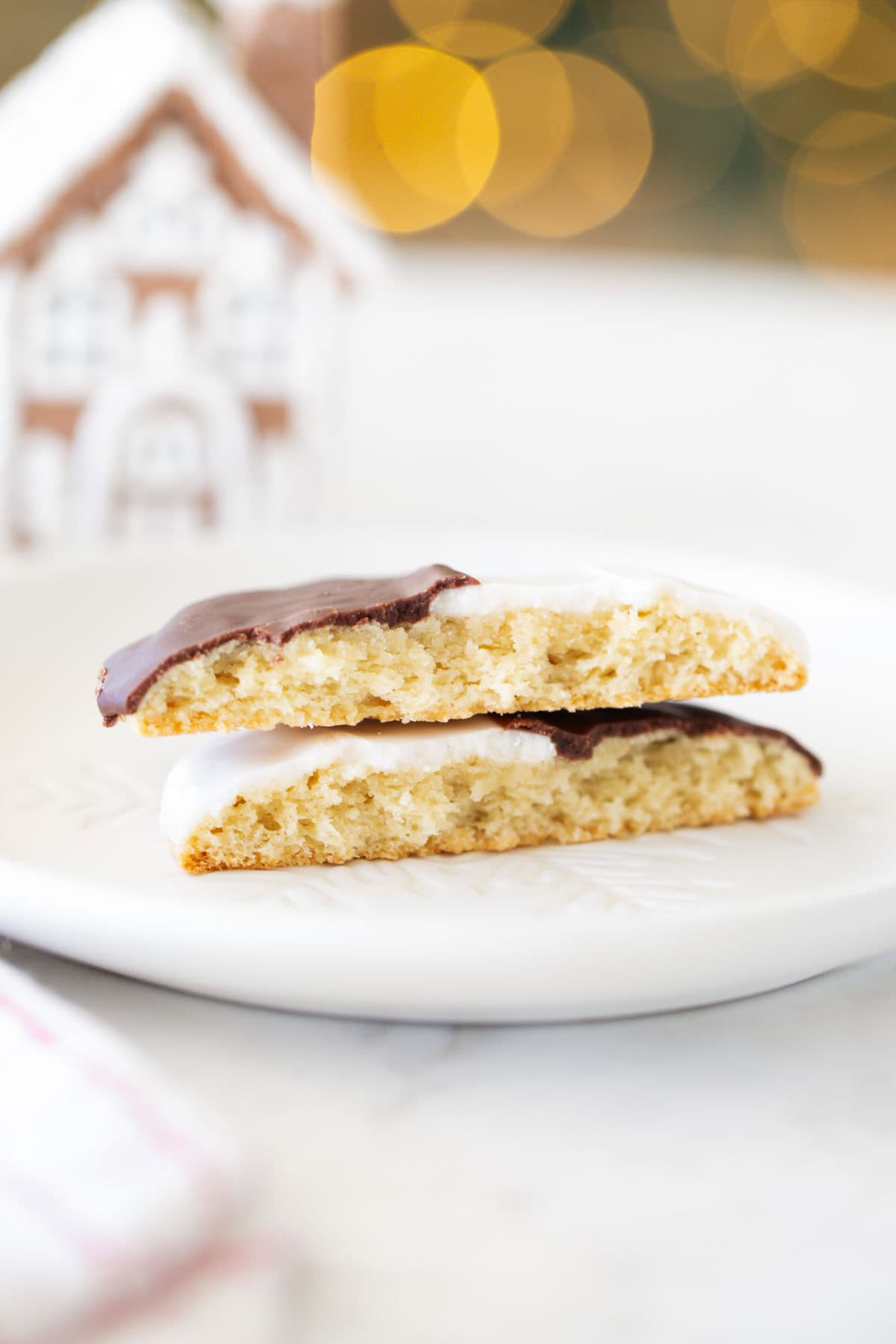 Stacked black and white cookies.