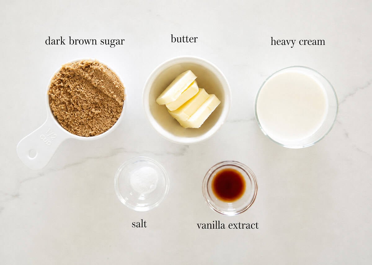 This butterscotch sauce is silky smooth with a sweet, buttery taste! It's a quick and easy homemade treat that elevates any ice cream, pie or dessert. Butterscotch ingredients on the counter.