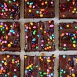 Three rows of sliced homemade cosmic brownies.