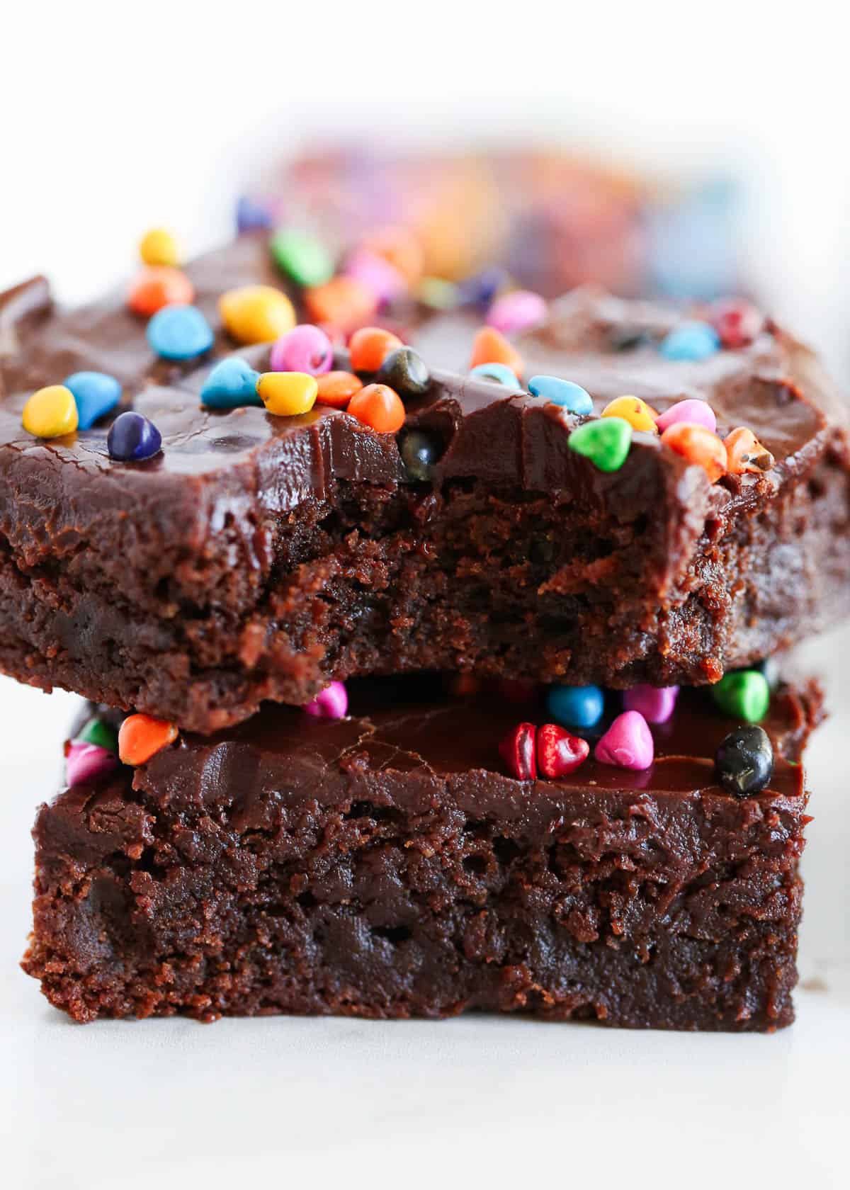 Two stacked homemade cosmic brownies.