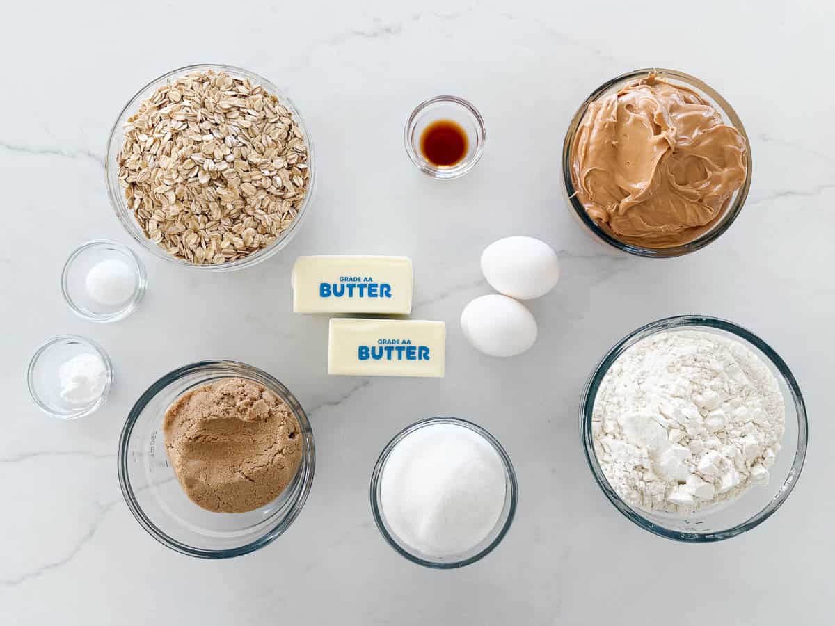 Oats, peanut butter, butter, sugar, eggs, cocoa powder and powdered sugar for lunch lady peanut butter bars.