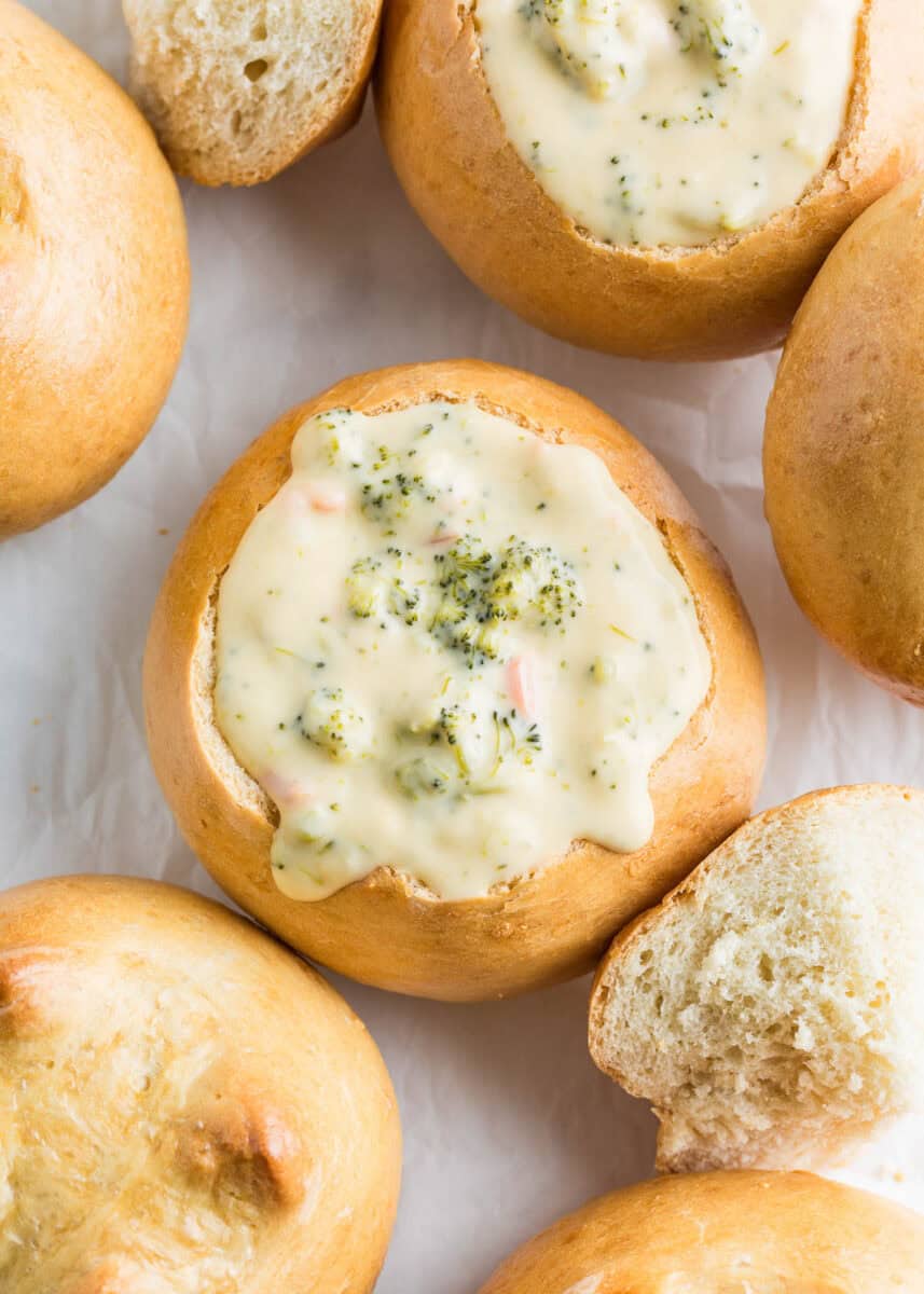 Easy homemade bread bowls made with just 6 simple ingredients! Golden brown on the outside and soft and fluffy on the inside. Tastes amazing served with warm soup inside. Homemade bread bowls with soup.