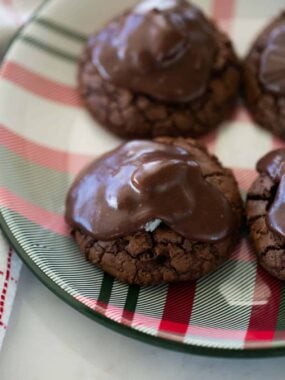 Chocolate almond joy cookies on plate.