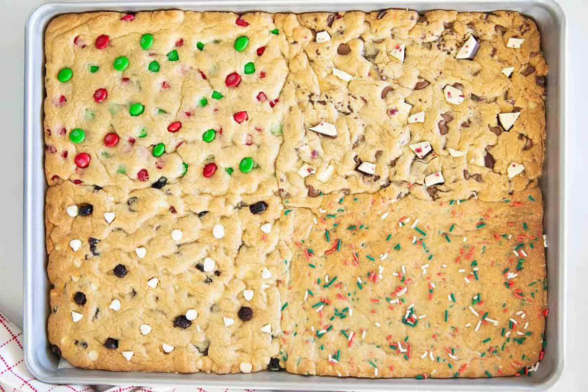 Sheet pan cookie bars for the holidays with 4-in-1 cookie mix-ins.
